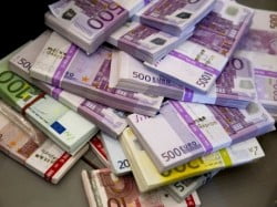 Money seized by German customs agency Zoll during anti-money laundering operation is displayed before agency's annual statistics news conference in Berlin