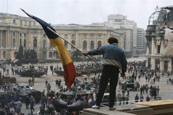 Man Waving a Romanian Flag