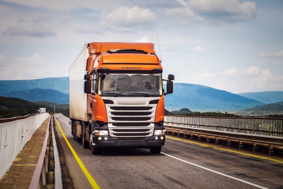 Orange truck on a road